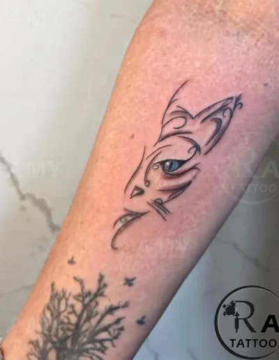 Ramy Tattoo Arm line cat